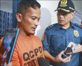  ?? JOVEN CAGANDE ?? NCRPO chief Director Guillermo Eleazar interrogat­es PDEA intelligen­ce officer Mario Luisito David Israel following Israel’s arrest Friday night.