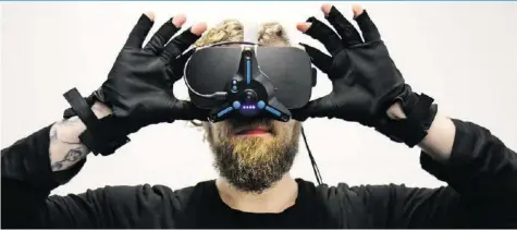  ?? 20M ?? Ein gutes Dutzend Sensoren sorgt dafür, dass die Bewegungen der Hände in die virtuelle Realität übertragen werden.