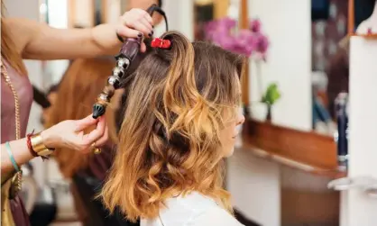  ??  ?? Hair styling is an industry that relies on independen­t contractor­s. Photograph: Nancy Honey/Getty Images/Cultura RF