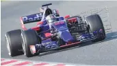  ?? — AFP ?? Scuderia Toro Rosso’s Spanish driver Carlos Sainz drives at the Circuit de Catalunya during the first day of the first week of tests for the Formula One Grand Prix season.