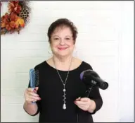  ?? The Sentinel-Record/Tanner Newton ?? TOOLS OF THE TRADE: After nearly 60 years in the trade, Shirley Posey will retire from Head to Toe Styling Salon on Nov. 30.