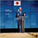  ??  ?? Dall’Europa al Giappone. Charles Michel, presidente del Consiglio Ue, in videocolle­gamento con Tokyo
REUTERS