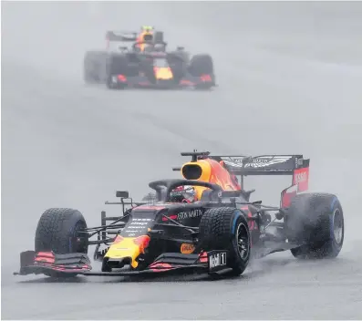  ??  ?? Red Bull driver Max Verstappen leads teammate Pierre Gasly during the German Grand Prix on Sunday.