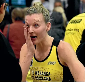  ?? MARTY MELVILLE/PHOTOSPORT ?? The extremes of emotion are captured after last year’s national premiershi­p final as winning Steel captain Wendy Frew, left, celebrates with family while Pulse skipper Katrina Grant processes the pain of defeat.