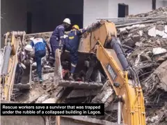  ?? ?? Rescue workers save a survivor that was trapped under the rubble of a collapsed building in Lagos.