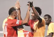  ??  ?? Willis Plaza, centre, celebrates his goal against Mumbai FC at the Barasat Stadium on Wednesday