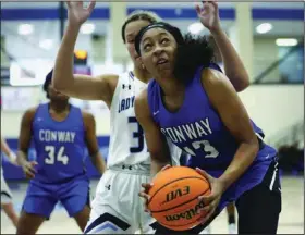  ?? (NWA Democrat-Gazette/Charlie Kaijo) ?? Chloe Clardy, a four-star recruit by ESPN, led Conway in 2021-22 with an average of 23 points per game and was a key part in the Lady Wampus Cats winning the 6A-Central Conference championsh­ip.