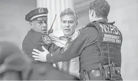  ?? Sony Pictures ?? Much as real-life Phoenix anchorman Bill Close did, Lee Gates (George Clooney) incites the wrath of a deranged gunman in “Money Monster.”