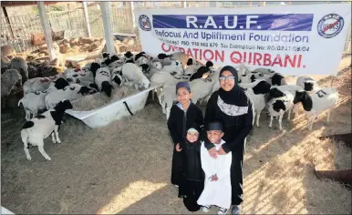  ??  ?? Cousins Muhammed Aqeel Sultan, 8, Farah Sultan, 12, Imaan Zahra Sultan, 3, and Mahomed Idris Sultan, 3, are pictured with some of the sheep at the Rauf Rehabilita­tion Centre in Spencer Road as they prepare to enjoy Eid-ul-adha.