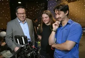  ?? John Beale/WQED ?? Jason Jedlinski, left, WQED teen film crew member Gabriel German and teaching assistant Vincent Cassano chat during a WQED Film Academy gathering at WQED’s Oakland studio in July 2023.