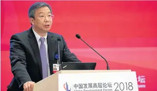  ?? /Reuters ?? Safe hands: China’s Central Bank Governor Yi Gang is expected to ensure policy continuity as China persists with its crackdown on risks and debt.