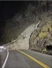  ?? CONTRIBUTE­D BY CALTRANS ?? Caltrans crews cleaned up a rock and mudslide on state Route 299 in the Hawkins Bar area. The highway reopened to one-way controlled traffic on Saturday afternoon.