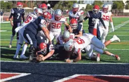  ?? ?? Benson’s Jace Barney (34) scores a touchdown at Coronado High School during the 2020 2A championsh­ip game.