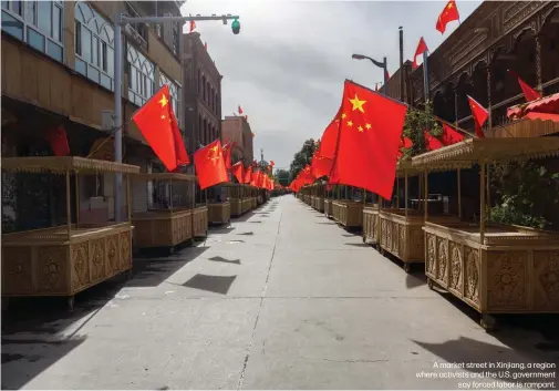  ??  ?? A market street in Xinjiang, a region where activists and the U.S. government
say forced labor is rampant.