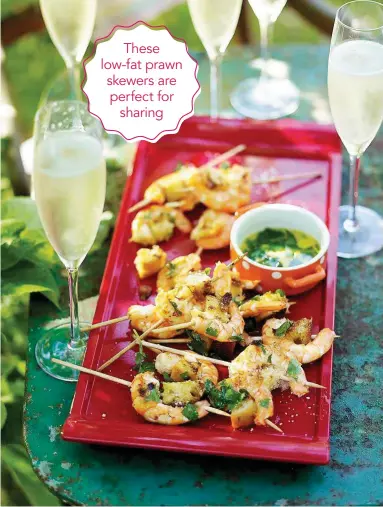  ??  ?? These low-fat prawn skewers are perfect for sharing
