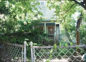  ?? Tyler Sizemore / Hearst Connecticu­t Media file photo ?? A blighted home on Mead Avenue in Byram in June 2019. The home has since been demolished and the RTM has now approved a blight ordinance that sets in place a process to deal with issues like this.