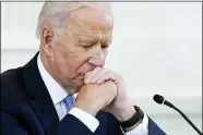  ?? EVAN VUCCI — THE ASSOCIATED PRESS ?? President Joe Biden listens during the Quad summit in the East Room of the White House on Sept. 24. President Joe Biden’s popularity has slumped — with half of Americans now approving and half disapprovi­ng of his leadership. That’s according to a new poll by The Associated PressNORC Center for Public Affairs Research.