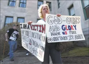  ?? Hearst Connecticu­t Media file photo ?? Ellen Harmon attends the Connecticu­t Citizens Defense League’s Rally for Our Rights in support of gun rights at the Connecticu­t State Capitol on April 14 in Hartford.