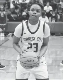  ?? Fred Conley • Times-Herald ?? Forrest City's Kyla Morrow sets to make a free throw during a recently played basketball game at Dwight Lofton Mustang Arena.