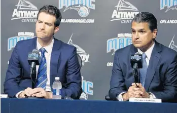  ?? STEPHEN M. DOWELL/STAFF FILE PHOTO ?? Magic CEO Alex Martins, right, is bringing in Raptors GM Jeff Weltman to head the team’s basketball operations, essentiall­y taking over for recently-fired GM Rob Hennigan, left. one of Weltman’s first tasks will be to hire a new GM.