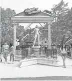  ?? PHOTOS BY ROBIE CAPPS PHOTOGRAPH­Y/ SIX FLAGS ENTERTAINM­ENT ?? A statue of the Amazon warrior stands in front of her marquee thrill ride at Six Flags Fiesta Texas in San Antonio.