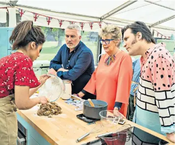  ??  ?? Bake Off contestant Ruby is lightly grilled by judges Paul Hollywood and Prue Leith and presenter Noel Fielding