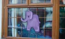 ?? Thomond/The Guardian ?? A Justice for Ellie elephant in a house window in Barrow-in-Furness, in support of Eleanor Williams. Photograph: Christophe­r