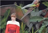  ??  ?? Bryce Dallas Howard arrives at the Los Angeles premiere of “Jurassic World: Fallen Kingdom” June 12. Howard wasn’t sure how people dealing with real volcanoes would receive the film’s fictional volcanic eruption.