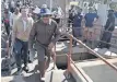  ?? ?? MINISTER of Water and Sanitation Senzo Mchunu and City of Tshwane mayor Cilliers Brink during an oversight project inspection of the Rooiwal Wastewater Treatment Works and Klipdrift Package Plant in Hammanskra­al. | OUPA MOKENA Independen­t Newspapers