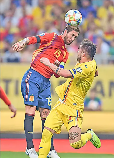  ??  ?? SERGIO Ramos’s first-half penalty carries Spain.