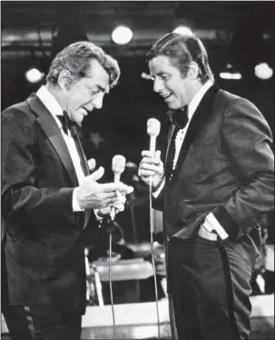  ?? The Associated Press ?? TELETHON: In this Sept. 7, 1976, photo, entertaine­rs Dean Martin, left, and Jerry Lewis appear together on Lewis's annual telethon for the Muscular Dystrophy Associatio­n in Las Vegas. Lewis, the manic, rubber-faced showman who jumped and hollered to...
