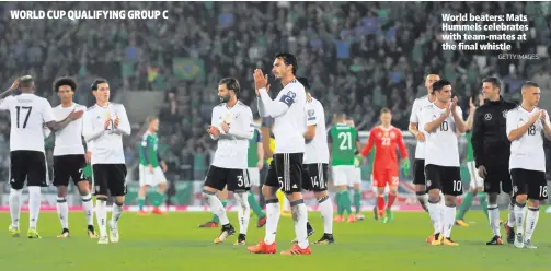  ?? GETTY IMAGES ?? World beaters: Mats Hummels celebrates with team-mates at the final whistle