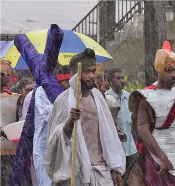  ?? ?? Holy Family parishione­rs in Labasa during the Station of the Cross walk on March 29, 2024.