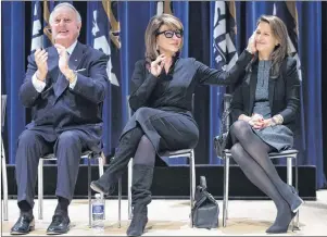  ?? CP PHOTO ?? Former Prime Minister Brian Mulroney, left, applauds as his wife Mila, centre, affectiona­tely acknowledg­es their daughter Caroline Mulroney Lapham during the announceme­nt of the $60 million Brian Mulroney Institute of Government and Mulroney Hall at...