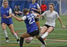  ?? CHRIS CHRISTO — BOSTON HERALD ?? Weymouth MA - January 21, 2024: Addison LamotheVau­ghn tries but can’t keep Caitlyn Driscoll from scoring a goal during the ASFL Soccer Courage Cup.