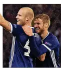  ??  ?? IMPACT: sub Armstrong hails goalscorer Steven Naismith (left)