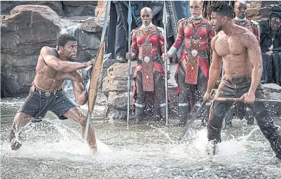  ?? MATT KENNEDY/MARVEL STUDIOS TRIBUNE NEWS SERVICE ?? T'Challa (Chadwick Boseman) and Erik Killmonger (Michael B. Jordan) star in Black Panther.