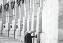  ?? Evan Vucci / Associated Press ?? President Joe Biden and wife Jill visit the National World War II Memorial on Tuesday in Washington.