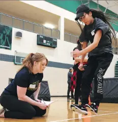  ?? MICHELLE BERG ?? Tejana Buffalo goes through a training exercise while taking part in the first day of a new Indigenous youth athlete program at the University of Saskatchew­an on Sunday.