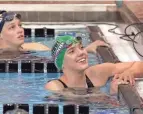  ??  ?? Dublin Coffman freshman Emily Brown, right, captured two state titles, in the 200 and 500 freestyle races.