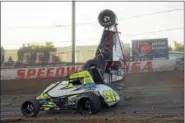  ?? RICK KEPNER - FOR DIGITAL FIRST MEDIA ?? Eric Daum goes airborne as Brady Bacon speeds past during a preliminar­y of the USAC AMSOIL National Sprint Car Series races at Grandview Speedway on June 14.