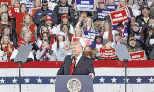  ?? Ben Gray The Associated Press ?? President Donald Trump addresses the crowd Saturday at a rally in Valdosta, Ga., for U.S. Sens. Kelly Loeffler, R-Ga., and David Perdue, R-Ga., both of whom are facing a runoff election that could determine the balance of power in the Senate.