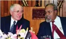  ??  ?? Sir Michael Somare speaking with Australian Prime Minister John Howard in 2002. Somare is credited with leading Papua New Guinea to its independen­ce from Australia. Photograph: Rocky Roe/AFP