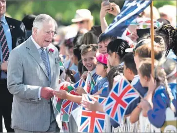  ?? Neil Munns EPA/Shuttersto­ck ?? PRINCE CHARLES visits Victoria Park in Swansea, Wales, this week. He’s also been visiting the dozens of charities supported by his Prince’s Trust; many Welsh say they appreciate his understate­d dedication.