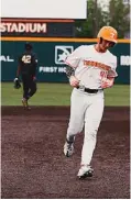  ?? TENNESSEE ATHLETICS PHOTO ?? Zane Denton rounds the bases Friday night after his second-inning home run gave Tennessee a 1-0 lead against No. 4 Vanderbilt inside Lindsey Nelson Stadium.