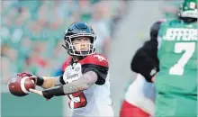  ?? MARK TAYLOR THE CANADIAN PRESS ?? Calgary Stampeders quarterbac­k Bo Levi Mitchell attempts a pass during first-half CFL action against the Saskatchew­an Roughrider­s. .