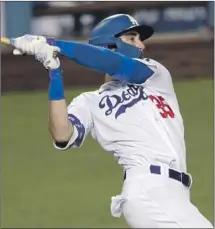  ?? Alex Gallardo Associated Press ?? CODY BELLINGER, belting a walk-off home run Saturday, is recapturin­g his form from last season after a slow start to 2020.