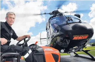  ?? PHOTO: STEPHEN JAQUIERY ?? Rolling out . . . Ian Ridley is hanging up his helmet, retiring after 30 years as a St John paramedic, including 21 years serving aboard rescue helicopter­s.