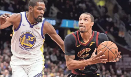  ?? ASSOCIATED PRESS ?? Cleveland Cavaliers guard George Hill drives past the Golden State Warriors’ Kevin Durant in a recent game.