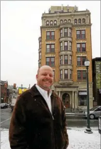  ?? PETE BANNAN - DIGITAL FIRST MEDIA ?? Thomas Myles stands in front of the Farmers and Mechanics Building at 2West Market Street in West Chester. The building will soon be undergoing renovation­s.